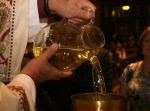 Oil pouring (Chrism)